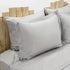 Lenjerie de pat 2 persoane Simple Silver prezentată pe pat dublu, material bumbac natural satinat Personalizabila